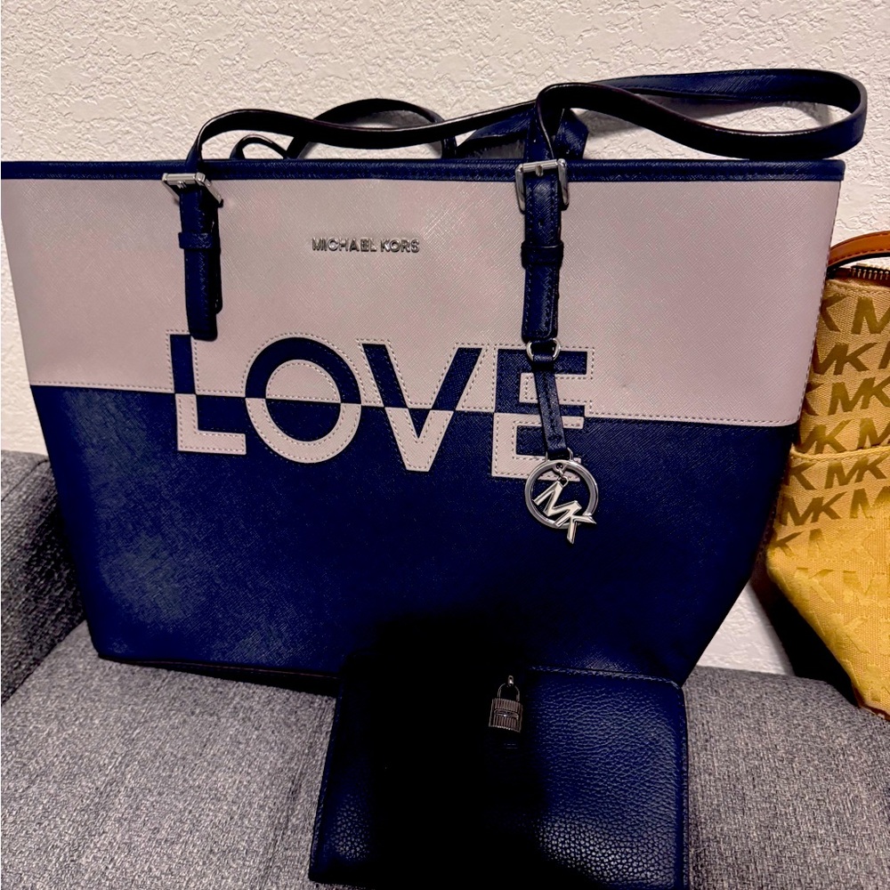 Brand new Michael Kors purse with wallet .